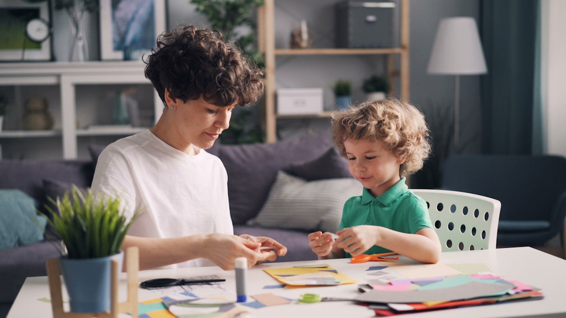 a man and a child sitting at a table